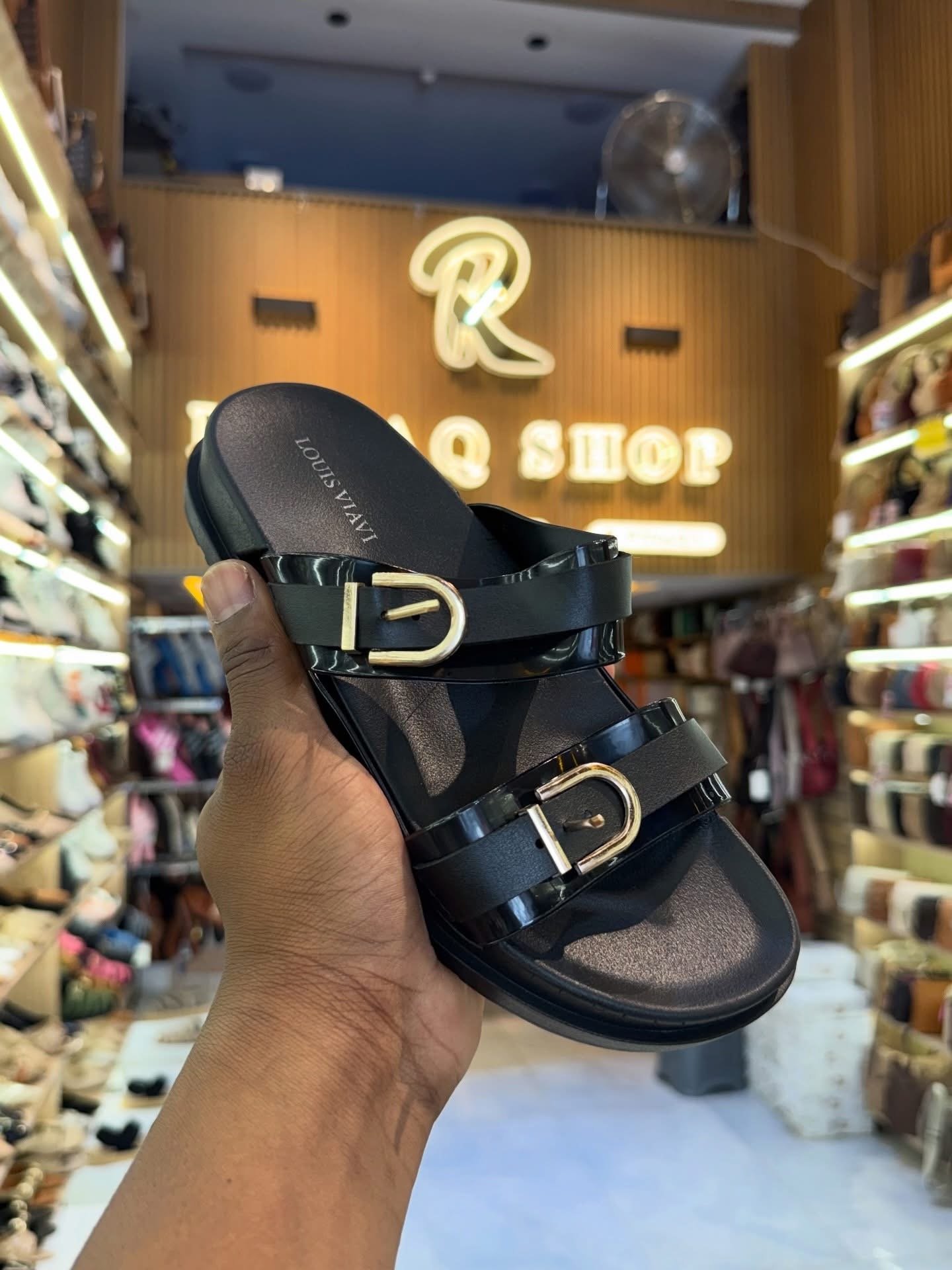 Mules à boucles noires